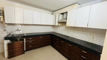 Kitchen in 3 BHK Builder Floor at Prem Satyam Swastik Apartment, Patiala Road – for Sale