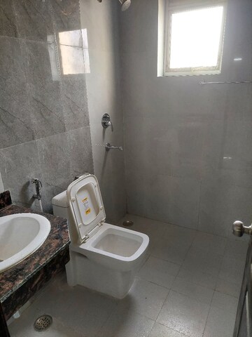 Bathroom in 5 BHK Builder Floor at Ansal API Esencia, Sector 67 – for Rent