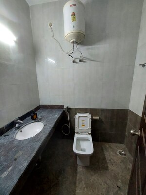 Bathroom in 5 BHK Builder Floor at Ansal API Esencia, Sector 67 – for Rent