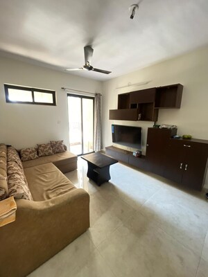 Living Room in 1.5 BHK Apartment at Lodha Palava Downtown Dombivli East, Dombivli East – for Rent