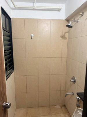 Bathroom in 3 BHK Apartment at Pride World City Kingsbury, Charholi Budruk – for Rent