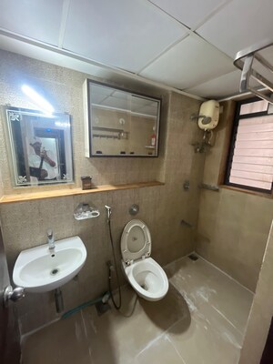 Bathroom in 1.5 BHK Apartment at Lodha Palava City Lakeshore Greens, Dombivli East – for Rent