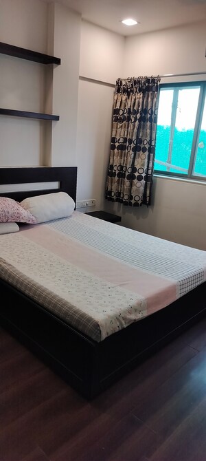 Bedroom in 3 BHK Apartment at Rajgir Milap CHS, Andheri West – for Sale