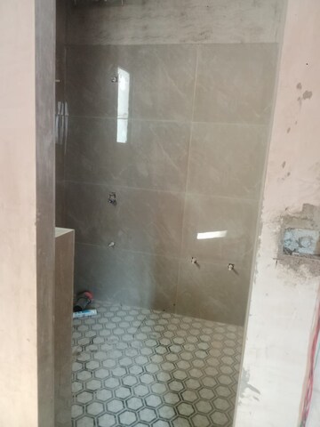Bathroom in 2 BHK Apartment at Raja Park – for Sale