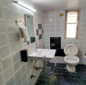 Bathroom in 5 BHK Apartment at Dhantoli – for Rent