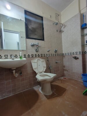 Bathroom in 2 BHK Apartment at Raunak Laxmi Narayan Residency, Pokhran Road No Two – for Rent