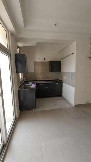 Kitchen in 2.5 BHK Apartment at Amrapali Princely Estate, Sector 76 – for Rent