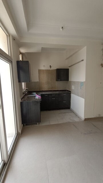 Kitchen in 2.5 BHK Apartment at Amrapali Princely Estate, Sector 76 – for Rent