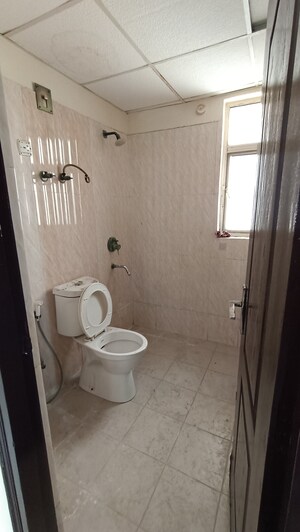 Bathroom in 2.5 BHK Apartment at Amrapali Princely Estate, Sector 76 – for Rent