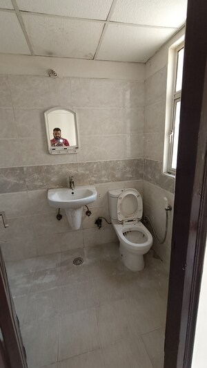 Bathroom in 2.5 BHK Apartment at Amrapali Princely Estate, Sector 76 – for Rent