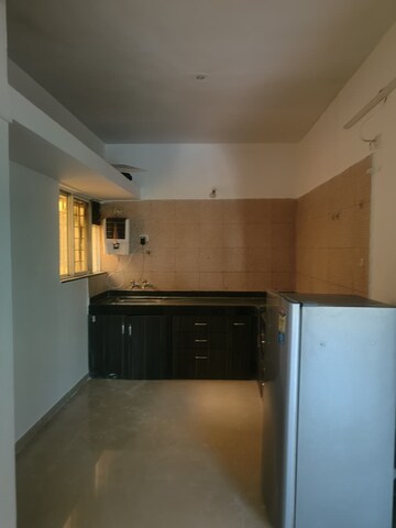 Kitchen in 2 BHK Apartment at G K Dwarka Queens Park, Pimple Saudagar – for Sale