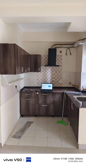 Kitchen in 2.5 BHK Apartment at Amrapali Princely Estate, Sector 76 – for Rent