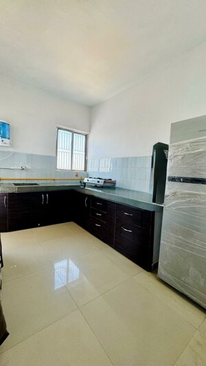 Kitchen in 2 BHK Builder Floor at Thaltej – for Rent