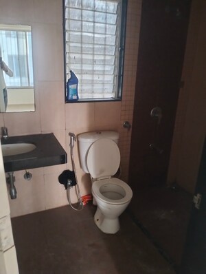 Bathroom in 2 BHK Apartment at Rama Celestial City, Ravet – for Rent