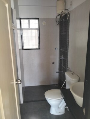 Bathroom in 2 BHK Apartment at Pharande Celestial City, Ravet – for Rent