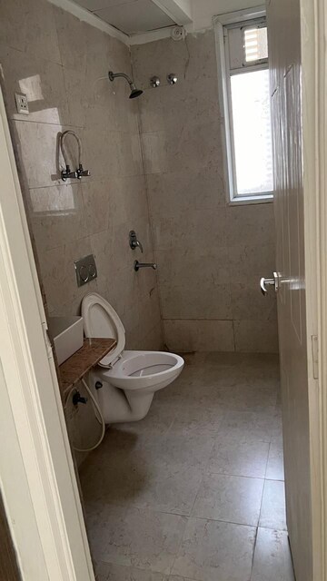 Bathroom in 2 BHK Apartment at Amrapali Silicon City, Sector 76 – for Rent