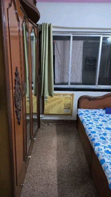 Bedroom in 2 BHK Apartment at Acme Enclave, Malad West – for Rent