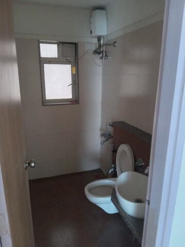 Bathroom in 2 BHK Apartment at Salasar Woods, Mira Road – for Rent