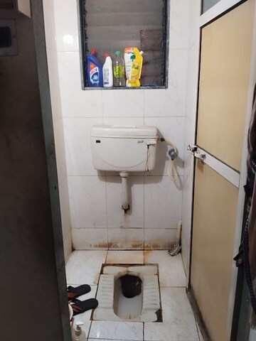 Bathroom in 1 BHK Apartment at Yashraj Park CHS, Kasarvadavali – for Sale