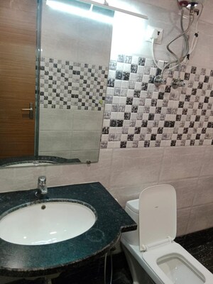 Bathroom in 4 BHK Apartment at Saya Gold Avenue, Vaibhav Khand – for Rent