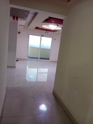 Living Room in 4 BHK Apartment at Saya Gold Avenue, Vaibhav Khand – for Rent