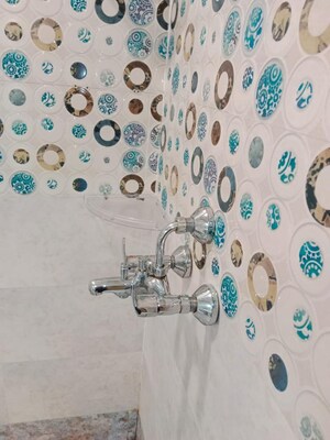 Bathroom in 4 BHK Apartment at Saya Gold Avenue, Vaibhav Khand – for Rent