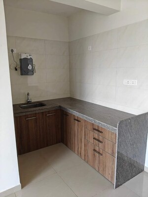 Kitchen in 1 BHK Apartment at Duville Riverdale Suites, Kharadi – for Rent