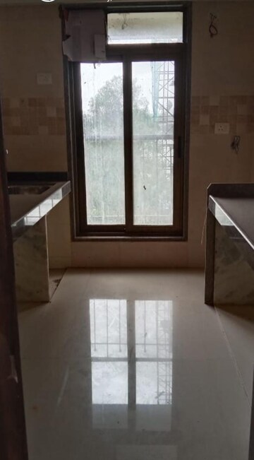 Room in 2 BHK Apartment at Abrol Avirahi Heights, Malad West – for Rent