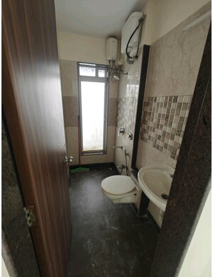 Bathroom in 1 BHK Apartment at Asha Ashok Smruti, Vadavali – for Sale