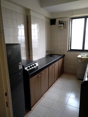 Kitchen in 1 BHK Apartment at Agarwal Trinity Towers, Malad West – for Rent