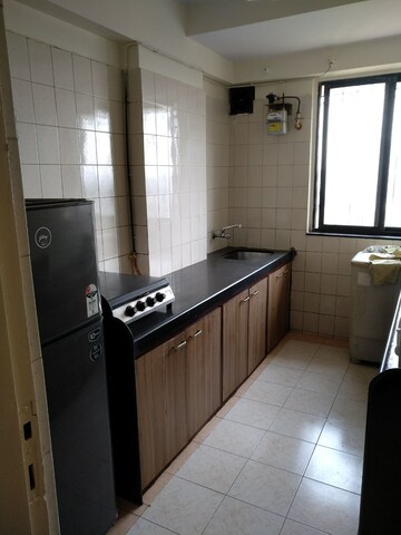 Kitchen in 1 BHK Apartment at Agarwal Trinity Towers, Malad West – for Rent
