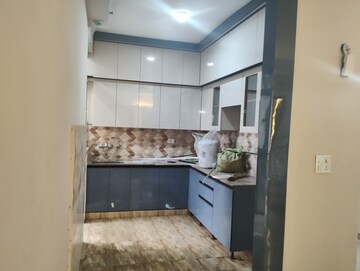 Kitchen in 2 BHK Apartment at Mahagun Mywoods II, Sector 16c Greater Noida – for Rent