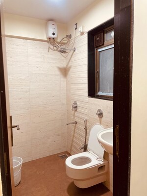 Bathroom in 3 BHK Apartment at Lakshachandi Heights, Goregaon East – for Rent