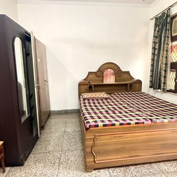 Bedroom in 3 BHK Builder Floor at Chattarpur – for Rent
