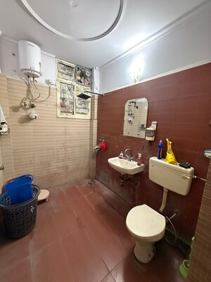 Bathroom in 3 BHK Apartment at Paschim Vihar – for Rent