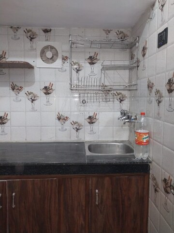 Kitchen in 1.5 BHK Apartment at Paschim Vihar – for Rent