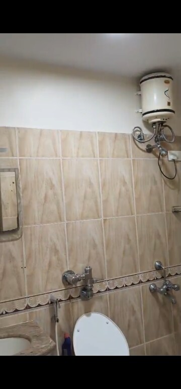 Bathroom in 2 BHK Apartment at Nilgiri C Wing CHS, Andheri East – for Rent