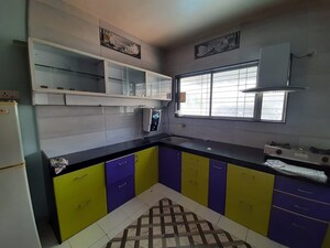 Kitchen in 2 BHK Apartment at B K Pate Golden Petals, Karve Nagar – for Rent