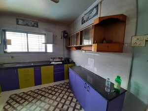 Kitchen in 2 BHK Apartment at B K Pate Golden Petals, Karve Nagar – for Rent