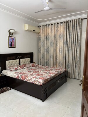 Bedroom in 3 BHK Builder Floor at Ansal Sushant Lok I, Sector 43 – for Rent