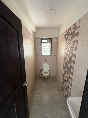Bathroom in 2 BHK Apartment at Navkar Sakshat Navkar, Borivali West – for Sale