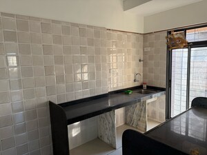 Kitchen in 2 BHK Apartment at Navkar Sakshat Navkar, Borivali West – for Sale