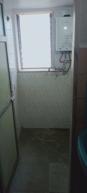 Bathroom in 1 BHK Apartment at Sai Anand CHS, Andheri East – for Rent