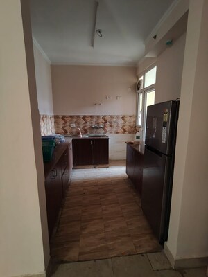 Kitchen in 3 BHK Apartment at Amrapali Golf Homes, Sector 4 Greater Noida – for Rent