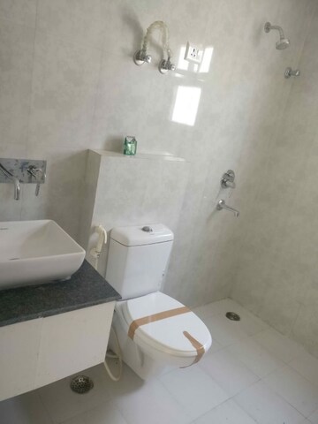 Bathroom in 3 BHK Apartment at Oxirich Avenue, Ahinsa Khand 2 – for Rent