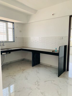 Kitchen in 2 BHK Apartment at Border Road Housing Society, Dhanori – for Rent