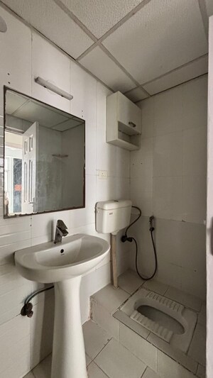 Bathroom in 2 BHK Apartment at SG Shikhar Height, Siddharth Vihar – for Rent