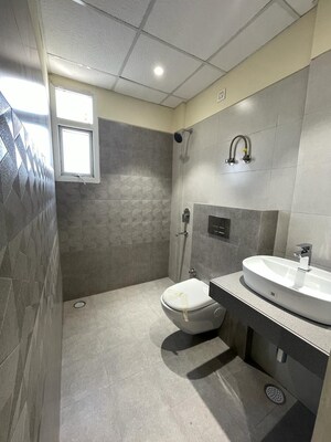 Bathroom in 3 BHK Apartment at Dhakoli – for Sale