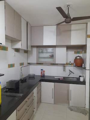 Kitchen in 3 BHK Apartment at Conwood Enclave, Vasant Vihar – for Rent
