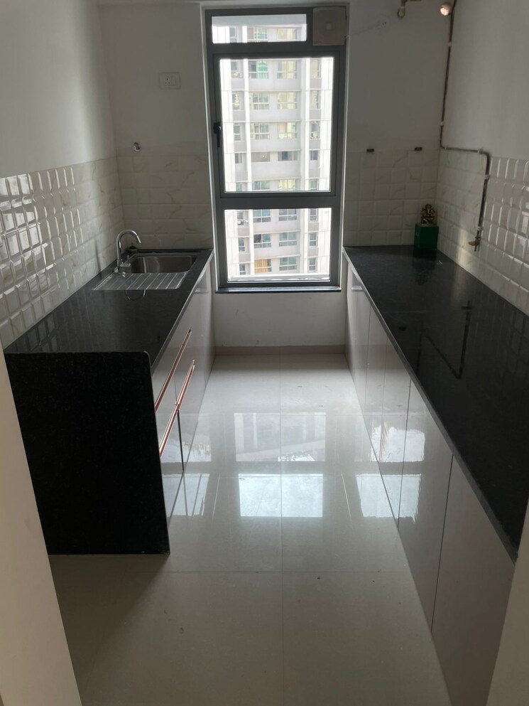 Kitchen, kalpataru-immensa-b 2 Bedroom 598 Sq.Ft. Apartment In Kolshet Road Thane 9666071